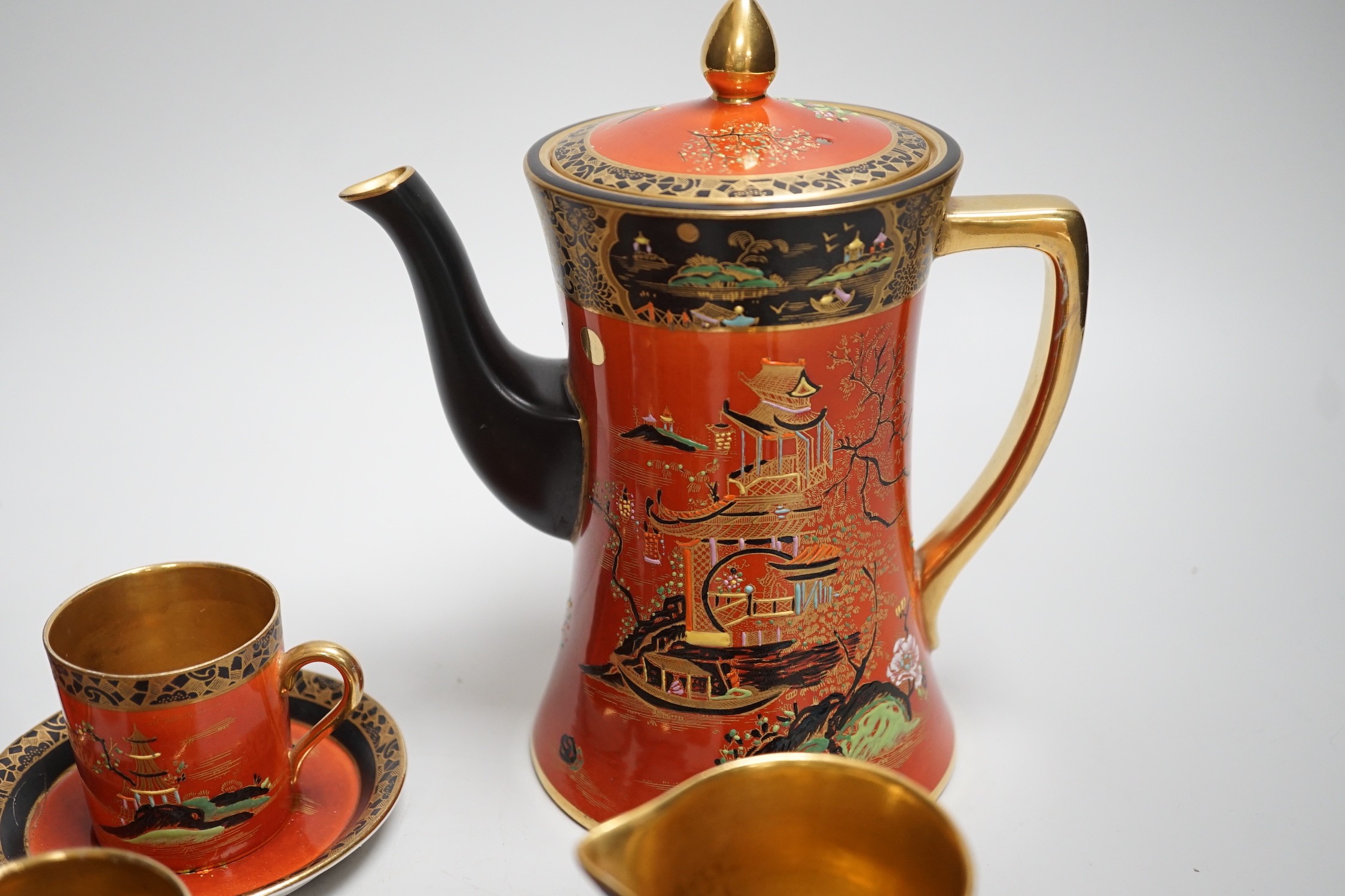 A Carltonware Japanese style coffee set: base marked 2880, coffee pot and cover 19.5 cms high